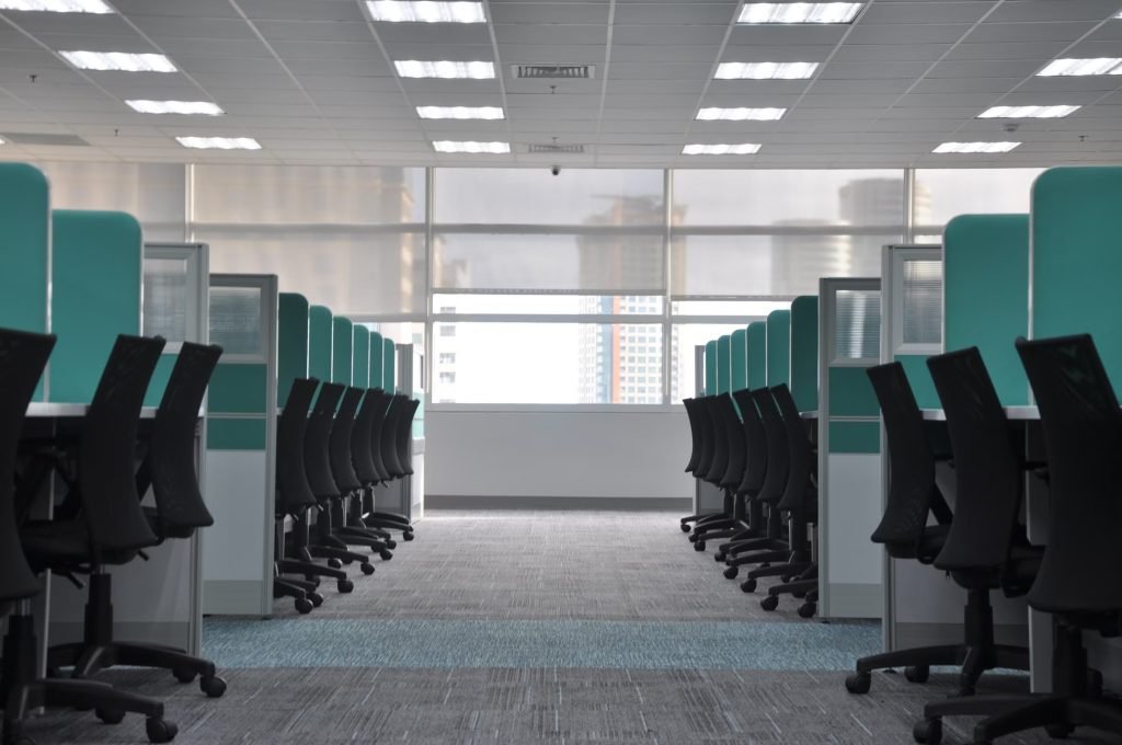 Office workstation with glass partitions for privacy