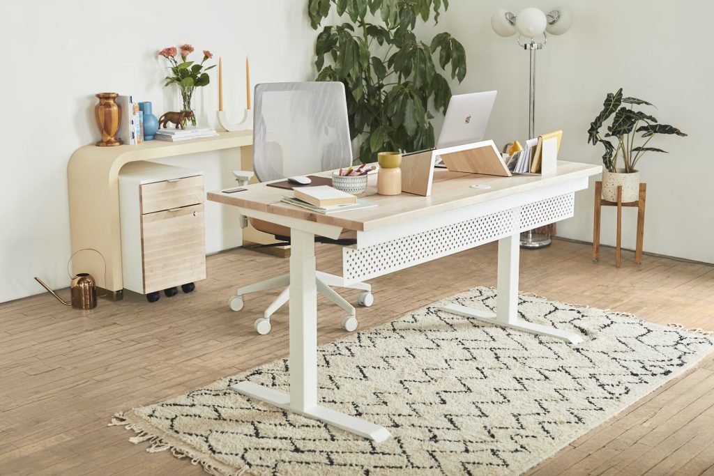 Factors to consider in executive office table design: shape, material, storage, ergonomics, and appearance.